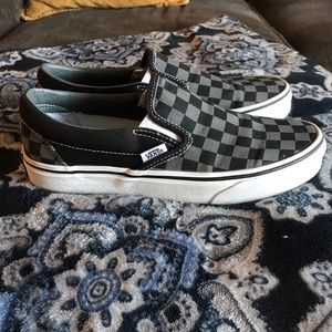Black and grey checkered vans
